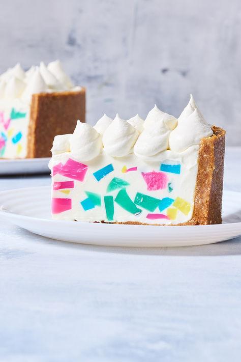 A dessert that's as visually stunning as it is delicious, this terrazzo jelly cheesecake is perfect for celebrating life's special moments. Terrazzo Cheesecake Recipe, Terrazzo Cheesecake, Woolworths Cake, Terrazzo Cake, Woolworths Cakes, Jelly Cheesecake, Jelly Crystals, Special Dishes, Jelly Cake