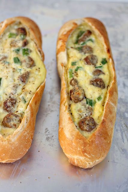 Egg Boats. These egg boats are a new breakfast favorite because they literally take less than five minutes to prep. Sourdough baguettes filled with sausage, eggs and lots of cheese, wrap in foil and heat over campfire until hot and toasty... so so good! Egg Boats Recipe, Sourdough Baguettes, Egg Boats, Sandwich Vegetarian, God Mat, Sausage And Egg, Think Food, Camp Cooking, Camping Food