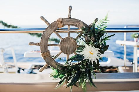 Invoking the true nature of a wedding at sea, this package includes anchor motifs, cool hues and seaside vibes. Learn more about our nautical wedding decor package here. #nauticalwedding #weddingatsea #boatwedding #destinationwedding #justmauid Yacht Club Wedding Decor, Boat Wedding Decorations, Yacht Wedding Decor, Yacht Proposal, Elegant Nautical Wedding, Sailing Wedding, Seaside Wedding Decor, Nautical Wedding Decor, Nautical Wedding Inspiration