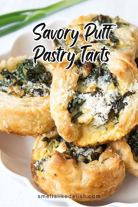 Quick and easy, these savory puff pastry tarts are filled with a 
spinach and feta cheese filling, and then baked until golden brown for 
delicious appetizers. Perfect for parties, potlucks, or a fancy 
weeknight treat.
This appetizer recipe is easy to make and so delicious, you'll want to make them again and again. Puff Pastry Recipes Goat Cheese, What To Put In Puff Pastry, Savory Turnover Recipes, Phyllo Pastry Recipes Breakfast, Phillo Puff Pastry Recipes Appetizers, Savory Filo Pastry Recipes, Phyllo Dough Recipes Savory, Tenderflake Puff Pastry Recipes, Best Puff Pastry Recipes