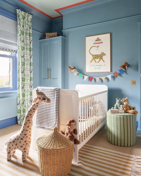 Christopher Farr Cloth | A room fit for every tiny explorer with big dreams! @brahammacnicollstudio has crafted the perfect toddler space, where animals and… | Instagram Color Drenching Nursery, Blue Safari Nursery, Bright Nursery Ideas, Shell Nursery, Dining Room Design Classic, Whimsical Room, Beige Nursery, Bright Nursery, Christopher Farr