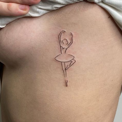 Ballerina tattoo on pale skin Ballerina Minimalist Drawing, Ballerina Tatoos, Fine Line Ballerina Tattoo, Dance Inspired Tattoos, Ballet Tattoo Ideas, Ballerina Tattoo Ideas, Ballet Tattoo Minimalist, Tiny Dancer Tattoo, Ballet Dancer Tattoo