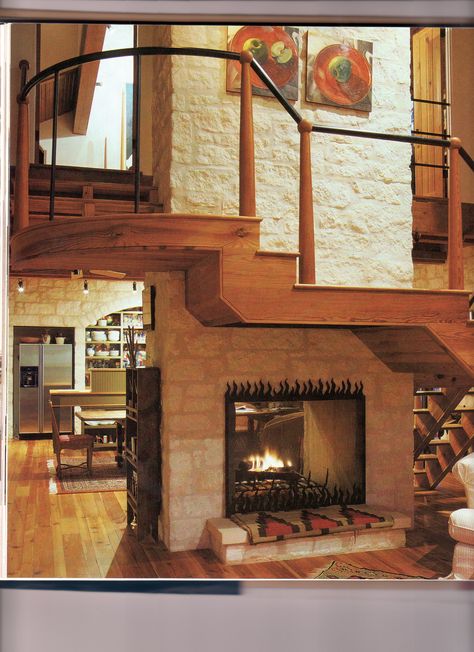 I love this - stairs wrap around the fireplace which makes good use of the deadzone under the stair, creates a central unifying architectural element, AND allows the staircase to be longer so that there are only 2-3 steps between landings (great for our aging bodies that still want to climb stairs) Not So Big House, Ideas Under Stairs, Stair Landings, Small Bookshelves, Fireplace Mantel Designs, Staircase Landing, Wood Fireplace Mantel, Mantel Design, Natural Homes