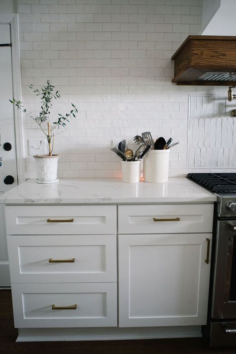 White Subway Tile Backsplash with White Quartz Countertops, White Cabinets and Gold Hardware Kitchen Backsplash With White Quartz Countertops, White Cabinets And Gold Hardware, Backsplash With White Quartz Countertops, Quartz Countertops White Cabinets, Quartz Countertops White, Countertops White Cabinets, White Subway Tile Kitchen, Backsplash Kitchen White Cabinets, White Cabinets White Countertops