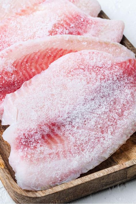 Frozen tilapia air fryer style is incredible. Just 12 minutes gets you fork tender and flaky fish for dinner. A healthy meal we all love. Frozen Fish Recipes, Frozen Fish Fillets, Frozen Tilapia, Frozen Scallops, Braised Chicken Breast, Frozen Fish, Frozen Salmon, Easy Fish Recipes, Tilapia Recipes