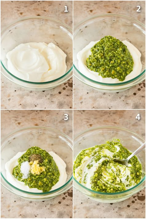 This pesto dip is a blend of mayonnaise, sour cream, basil pesto and seasonings that are combined to create a rich and creamy dip in just minutes. The easiest last minute appetizer option that pairs well with bread, veggies or can even be used on a sandwich or as a salad dressing. Pesto Bread Dipping Sauce, Pesto Oil Dip, Pesto Dipping Sauce For Bread, Pesto Bread Dip, Creamy Pesto Dip, Pesto Spread For Bread, Basil Dip Recipes, Pesto Dip Recipe, Cream Cheese Pesto Dip