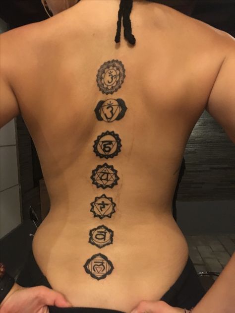 Chakra tattoo Back Tattoos Chakras, Back Tattoo Women Chakra, Chakra Back Tattoo Black Women, Chakra Back Tattoo Women, Tattoos For Creatives, Back Chakra Tattoo, Chakra Spine Tattoos For Women, Chakras Back Tattoo, Chakra Tattoo Spine