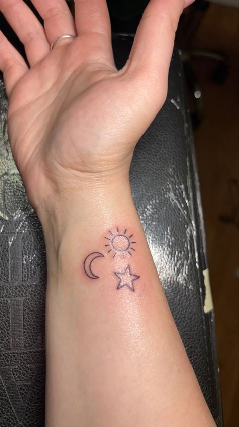 Celestial Friendship Tattoo, Wrist Stars Tattoo, Star Moon And Sun Tattoo, Sun Moon And Star Tattoo, Foot Tattoo Ideas Female, Female Foot Tattoos, Tattoo Ideas Female Foot, Sun Moon Star Tattoo, Sun Moon Stars Tattoo