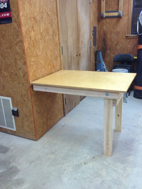 Ahhh! My shop is on it’s way to becoming functional! I still have plenty of projects to go, but at least one more is off the list. Take a look and let me know what you think of my fold down w… Woodworking Space, Work Garage, Workbench Table, Building A Workbench, Folding Workbench, Fold Down Table, Drop Down Table, Work Benches, Diy Workbench