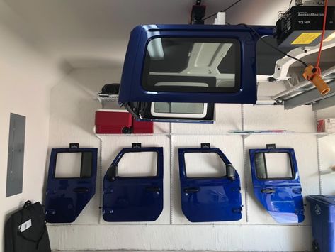 Jeep Garage Ideas, Jeep Door Storage Diy, Jeep Door Storage, Jeep Door Hanger, Jeep Storage, Usa Door Hanger, Jeep Wrangler Doors, Jeep Camper, Jeep Garage