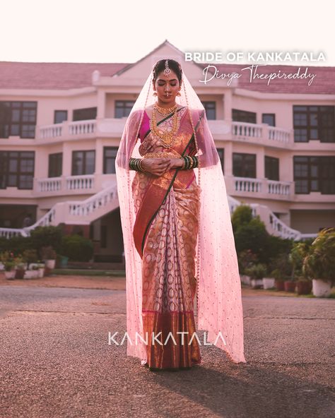 Draped in our mesmerizing Handpicked Kanchipuram Silk Tissue Brocade Pink Saree, Bride of Kankatala Divya Theepireddy transcended the boundaries of beauty as she embraces a realm of surreal elegance. The resplendent metallic tissue, curated from our illustrious Indian metallics collection, bestowed upon her an otherworldly glow. #brideofkankatala #clientdiaries #kankatala #kankatalasarees #kanchipuramsaree #kanchipuram #silksaree #queenofsarees Pink Saree Bride, Saree Bride, Kanchi Saree, Wedding Saree Collection, Wedding Saree, Kanchipuram Saree, Pink Saree, Bridal Saree, Saree Collection