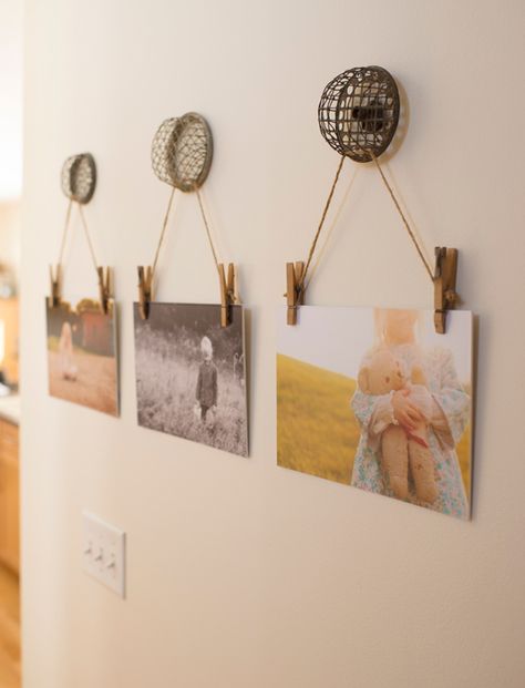 The cutest way to hang family photos! Hanging Family Photos, Diy Photo Wall, Hang Pictures, Display Family Photos, Clothes Pin Crafts, Hanging Photos, Flower Frog, Picture Hanging, Hanging Pictures