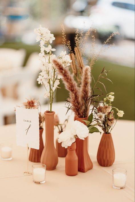 Terracotta Wedding Vases, Desert Flower Centerpieces, Terracotta And Greenery Wedding Centerpieces, Terracotta Wedding Centerpieces Flowers, Terracotta Bud Vases Wedding, Boho Vase Centerpieces, Fall Bud Vases Wedding Centerpiece, Terracotta Vases Wedding, Earth Tone Flower Arrangements