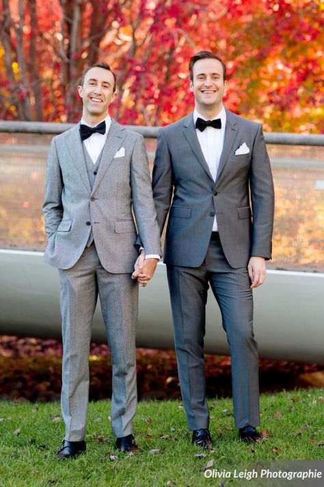 The grooms wore black bow ties with grey suits. Bow ties for $19 at www.TheTieBar.com | Photo Credit: Olivia Leigh Photographie Grey Suit With Bow Tie, Grey Suit Bow Tie, Suit With Bow Tie, Suit Bow Tie, Gay Wedding Photography, Groom Suit Grey, Bow Tie Suit, Grey Suits, Gay Weddings