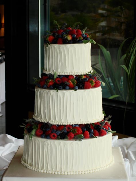 Buttercream and fresh fruit wedding cake Fruit On Wedding Cake, Fruit Cake For Wedding, Wedding Cake Tres Leches, Wedding Cake With Fresh Fruit, Huckleberry Wedding Cake, Wedding Cakes Strawberries, Wedding Cake Fresh Fruit, German Wedding Cake, Berry Chantilly Wedding Cake