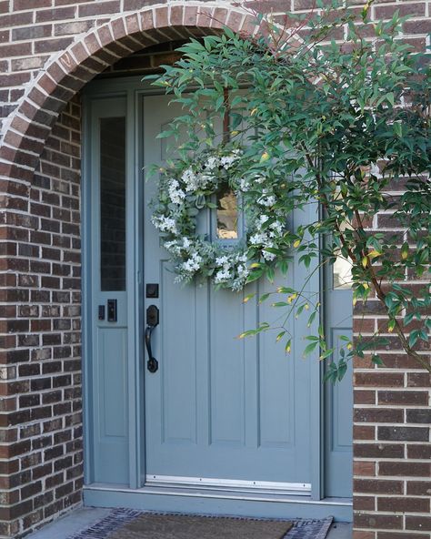 Tudor Update: The floors are currently being sanded and finished, the cabinets and island are in the works, and the screened in porch is being finished. We’ve still got a little ways to go, but I am counting down the days! Also, I had SO many people ask me about this front door color and I truthfully have no idea. The previous owners painted it before we bought it, but I think it’s somewhere between SW Jasper Stone and SW Acacia Haze. Scroll to the end to see a comparison. In person, I thoug... Front Door Blue Colors, Sw Jasper Stone, Sw Acacia Haze, Sw Jasper, Acacia Haze, Mc Gee And Co, Limestone House, Front Door Color, Granny Pod