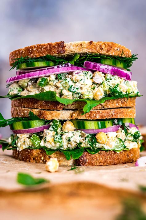 This Smashed Chickpea Salad features crisp veggies, tangy feta, briny capers and loads of fresh herbs, tossed with protein-packed chickpeas in a zingy lemon dressing. The perfect vegetarian lunch, dinner or cookout side dish. Made with just 8 simple ingredients and ready in 15 minutes! Smashed Chickpea Wrap, Smashed Chickpea Sandwich, Chickpea Sandwich Recipes, Chick Pea Salad Sandwich, Chickpea Lunch, Chickpea Salad With Feta, Smashed Chickpea Salad, Smashed Chickpea, Catering Recipes