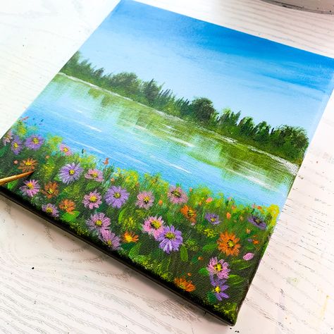 Acrylic painting on canvas of a spring landscape scenery. The painting presents a scenery of blue sky with reflection on the lake and colourful daisy flowers by the lake Nature Acrylic Painting Canvases, Colourful Acrylic Paintings, Nature Drawing Colourful, Lake Painting Easy, Happy Painting Ideas, Mini Canvases, Art Ideas Painting Canvases, Blue Sky Watercolor, Bright Gouache Painting