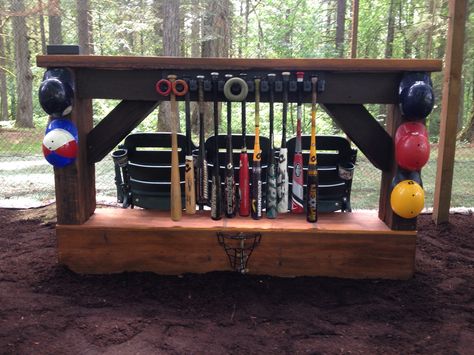 Backyard baseball bat rack, bar, and stadium seats for backyard batting cage fun !! Batting Cage Backyard, Baseball Bat Rack, Baseball Display Case, Backyard Sports, Batting Cage, Backyard Baseball, Fun Backyard, Baseball Display, Baseball Crafts