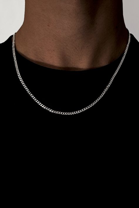 This 3mm Cuban Link Necklace for men is a stylish and durable accessory, perfect for daily use or as a standout piece for special occasions. Its high-quality stainless steel construction ensures long-lasting wear, while the trendy streetwear-inspired design adds a touch of modern flair. Versatile and classy in silver color, this necklace seamlessly complements any outfit style. A thoughtful gift option for friends, family, or yourself. Explore more unique accessories at our Etsy shop. Silver Cuban Link Chain, Masculine Jewelry, Minimalist Streetwear, Cuban Link Necklace, Masculine Style, Cuban Link Chain, Cuban Link, Minimalist Necklace, Chains For Men