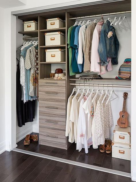 Condo closet features modular brown melamine shelving units and chest of drawers next to stacked clothes rails. Condo Closet, Transitional Closet, Window Paint, Closet Storage Systems, Closet Clothes Storage, Baby Closet Organization, Modular Closets, Reach In Closet, Classic Closet