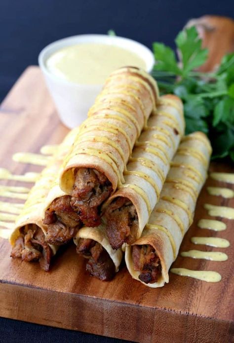 This Honey Mustard Pulled Pork Taquitos recipe is perfect for appetizers or dinner! Taquitos Pork, Mustard Pulled Pork, Pulled Pork Taquitos, Pork Taquitos Recipe, Pork Taquitos, Honey Mustard Sauce Recipe, Pulled Pork Leftover Recipes, Mexican Entrees, Bbq Pulled Pork Recipe