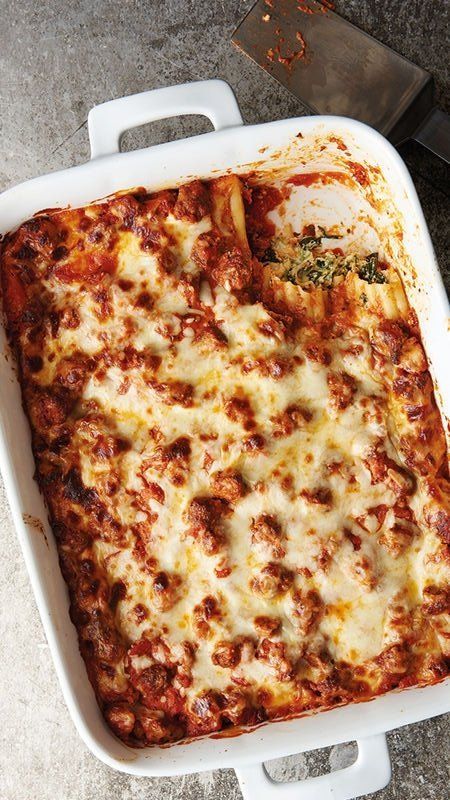 Classic Italian baked pasta with ricotta, spinach, cream, beef and oh so much cheese, Million-Dollar Manicotti is worth every bite. Manicotti Recipe With Cream Cheese, Million Dollar Manicotti, Baked Pasta With Ricotta, Manicotti Recipes, Ricotta Pasta Bake, Pasta With Ricotta, Ricotta Spinach, Ricotta Filling, Manicotti Recipe