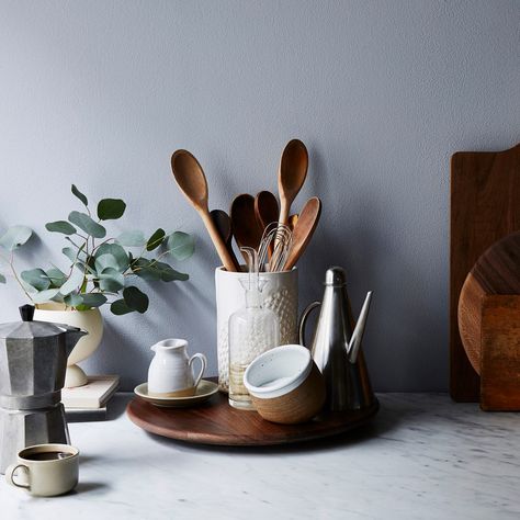 A Lazy Susan Makes Everything a Little Bit Easier | Epicurious Kitchen Cabinet Storage Solutions, Cabinet Organizers, Lazy Susans, Countertop Decor, Kitchen Decor Apartment, Kitchen Counter Decor, Counter Decor, Boho Kitchen, Decor Essentials