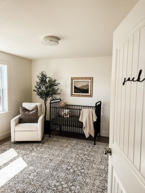 Neutral Simple Nursery Ideas, 2nd Trimester Photo Ideas, Nursery Organic Modern, Nursery With Dark Wood Trim, Tan Walls Nursery, Mixing Wood Tones Nursery, Nursery With Dark Carpet, Organic Neutral Nursery, Dark Floor Nursery Ideas