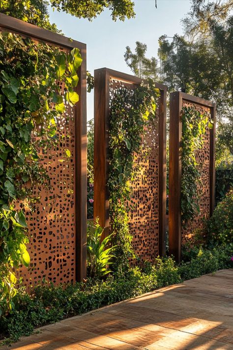 Looking to add privacy and style to your garden? Perforated metal panels are an easy, modern solution! These sleek panels create defined spaces while letting in natural light and airflow, giving your outdoor area both function and flair. 🌞✨ Garden Dividers, Perforated Metal Panel, Garden Screens, Plant Installation, Screen Plants, Screen Wall, Minimalist Garden, Courtyard Design, Garden Screening