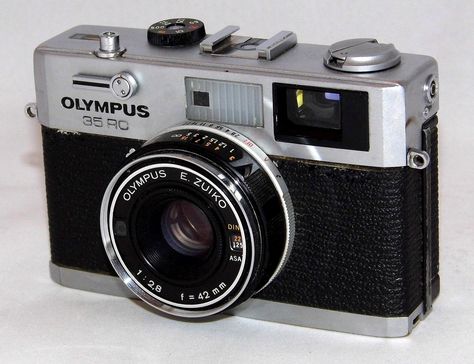 https://flic.kr/p/XoxJr4 | Vintage Olympus 35RC 35mm Rangefinder Camera, Made In Japan, A Very Compact Rangefinder Camera, Circa Early 1970s | Auction Item 171 - To be auctioned by Cledis Estes Auctions II in Medina, Ohio. 35 Mm Camera, 60s Camera, Olympus 35rc, 70s Camera, 1970s Camera, 80s Camera, 70s Items, Vlog Camera, Expensive Camera