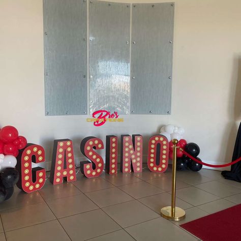 Happy Birthday! | CatchMyParty.com Casino Night Photo Backdrop, Diy Casino Decorations, Las Vegas Party Theme, James Bond Theme Party, Casino Theme Party Decorations, James Bond Party, Las Vegas Party, Casino Party Decorations, Casino Decorations