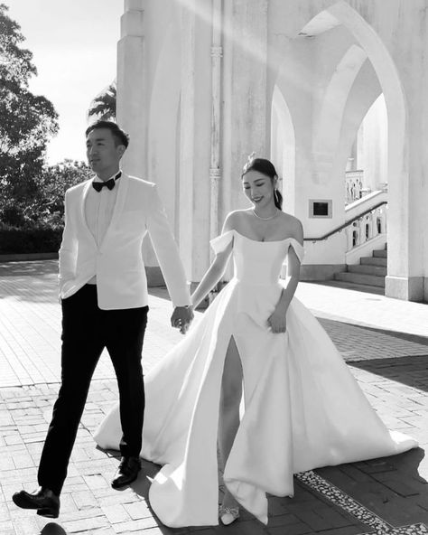 Photo by The Suite on February 11, 2024. May be a black-and-white image of 2 people, suit, gown, dinner jacket, dress and wedding.    #Regram via @C3Q5fmZh15Y White Jacket Groom And Bride, White Dinner Jacket Wedding, Bianca Jagger Wedding Suit, White Tailored Suit For Black-tie Events, White Wedding Tuxedo With Detailing, White Double-breasted Suit With Notch Lapel For Wedding, Dinner Jacket Wedding, Suit Gown, White Wedding Suit