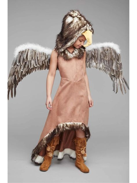 PRICES MAY VARY. Costume includes dress and hood. Faux suede dress trimmed with faux fur. The separate hood features a plush beak. Premium fabrics and quality Accessories sold separately You put the regal in eagle! Glide along in this flattering faux suede dress with faux fur trim. Its hem dips gracefully in back. The striking separate hood (included) features a plush beak. Take flight on Halloween night with our magnificent feather wings. Polyester. Regal eagle costume for girls is imported. Eagle Costume, Queen Bee Costume, Owl Costume, Costume For Girls, Chasing Fireflies, Cheerleader Costume, Faux Suede Dress, Goddess Costume, Dress Trims