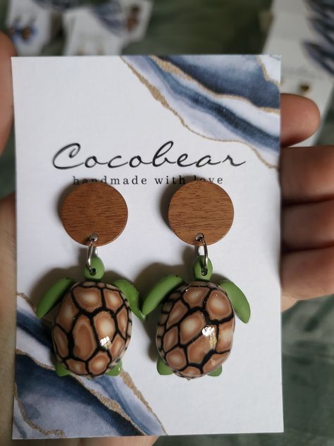 Polymer clay and resin sea turtle earrings. turtle shell. coconut studs. Cocos keeling Islands. Polymer Clay Tortoise Shell Tutorial, Polymer Clay Tortoise, Tortoise Clay Earrings, Tropical Clay Earrings, Tortoise Shell Clay Earrings, Turtle Shell, Turtle Earrings, Gold Flakes, Faux Stone