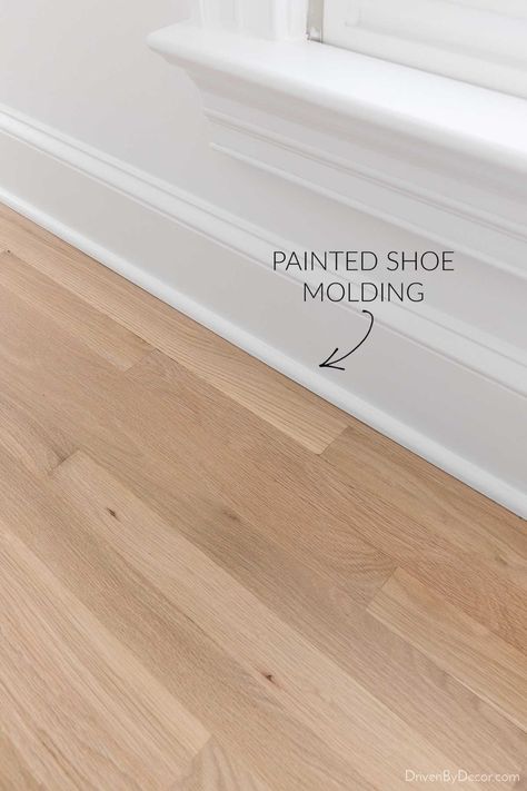 New shoe molding painted white Hardwood Floor Stain Colors, Oak Floor Stains, Floor Stain Colors, Staining Wood Floors, Wood Floor Stain Colors, Hardwood Floor Refinishing, Cottage Flooring, Red Oak Hardwood Floors, Floor Refinishing