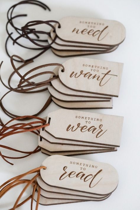 "Our set of 4 something gift tags make gifting meaningful and unique. Use them for all occasions year after year! Set includes 1x- Something to read Something you want Something you need Something to wear Available in 3 different shapes and different string colors. 𝐃𝐈𝐌𝐄𝐍𝐒𝐈𝐎𝐍𝐒/𝐌𝐄𝐀𝐒𝐔𝐑𝐄𝐌𝐄𝐍𝐓𝐒: Approx. 3.5\" x 1.5\" Note: Our pieces are made to order. Each piece of wood is hand selected and may have perfect imperfections such as knots, nicks, or grain variations. Therefore, ever Laser Christmas Ideas, Laser Cut Gift Ideas, Want Need Wear Read, Engraved Christmas Gifts, Something To Read, Wood Laser Ideas, Glowforge Projects, Engraving Ideas, Boho Crafts Diy