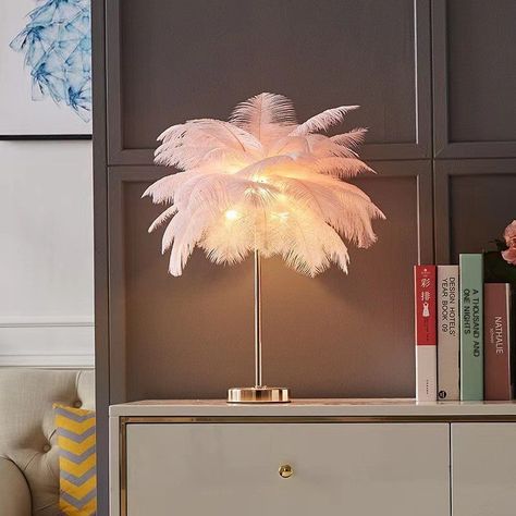 Description Warm Feather Night Light - Embrace Cozy Comfort and Gentle Glow 🌙🪶 Transform your space into a haven of warmth and relaxation with the Warm Feather Night Light. Designed to bring both comfort and style, this unique night light creates a soothing, gentle glow that brings peace and serenity to your bedroom, living room, or any cozy corner of your home. 🪶 Elegant Feather Design for a Cozy Ambiance This night light features a beautifully crafted feather design that evokes a sense of s