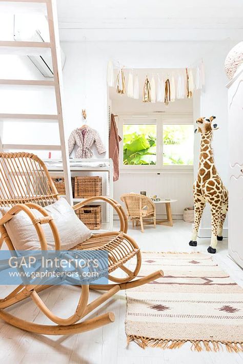 Cane rocking chair in nursery Rocking Chair In Nursery, Chair In Nursery, Wicker Rocking Chair Nursery, Boho Kids Rocking Chair, Rattan Rocking Chair Nursery, Cane Rocking Chair, Cane Bentwood Rocking Chair, Obaby Rocking Chair, Chair Nursery