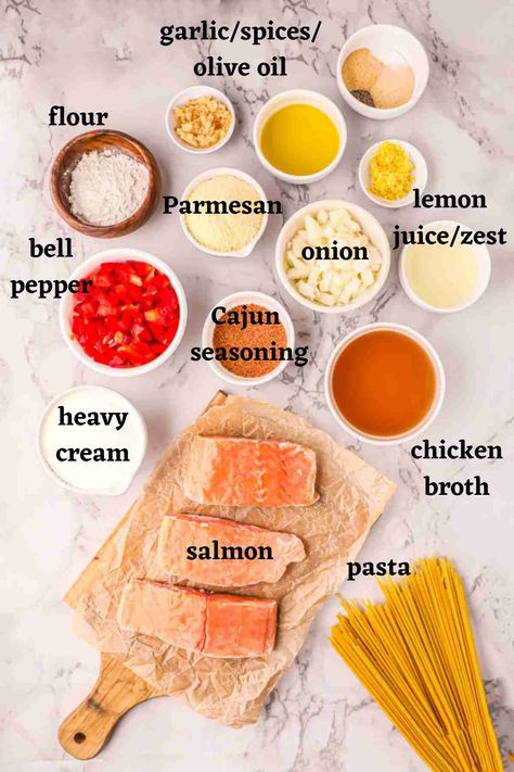 This creamy cajun salmon pasta is a mouth-watering combination of perfectly seared salmon, al dente pasta, and a rich and flavorful cajun cream sauce. With just the right amount of spice and a silky smooth texture, this dish is sure to impress any seafood lover. Whether you're looking for a cozy weeknight meal or a show-stopping dinner party dish, this recipe is easy to make and always a crowd-pleaser. Pin it now to add a little bit of Cajun flair to your next pasta night! Cajun Salmon Pasta Recipes, Creamy Cajun Salmon, Cajun Salmon Pasta, Salmon With Cream Sauce, Cajun Cream Sauce, Salmon Pasta Recipes, Fish Pasta, Cajun Salmon, Dinner Party Dishes