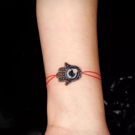 Nico Molina | Hamsa Hand Bracelet [art by: Nico Molina] #realismtattoo #hamsa #colortattoo #bracelet #feminine #fkirons #kwadroncartridges… | Instagram Small Evil Eye Tattoo, Small Hamsa Tattoo, Fatima Hand Tattoo, Hamsa Hand Tattoo, Evil Eye Tattoo, Hamsa Tattoo, Bracelet Art, Face Art Makeup, Tatuaje A Color