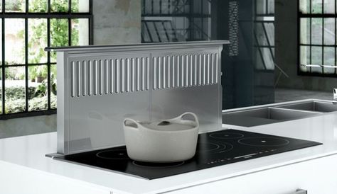 How to keep a kitchen looking open, airy, and well ventilated? Meet the range hood alternative, the pop-up stovetop vent. Oven Vent, Downdraft Vent, Island With Stove, Stove Vent, Range Vent, Kitchen Vent, Hood Vent, Exhaust Hood, Kitchen Hoods