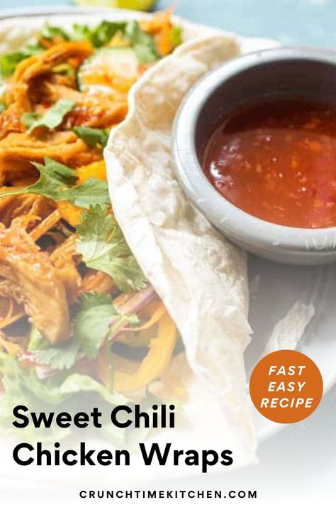 Shredded chicken simmered in a simple sweet chili lime sauce and stuffed inside tortilla or flatbread wraps with fresh, crunchy veggies. The perfect quick wrap for dinner! | crunchtimekitchen.com #wraps #chickenwraps #spicy #sweetchili #easyrecipes #quickmeals Sweet Chili Chicken Sandwich, Sweet Chili Chicken Wrap, Wendys Spicy Chicken Wrap, Mcdonald’s Sweet Chili Wrap, Crunchy Southwestern Chicken Wrap, Chili Lime Sauce, Sweet Chili Chicken, Great Chicken Recipes, Red Onion Salad