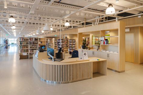 Finspång library | Artigo Library Reading Room Public, Library Self Checkout, Library Lighting Design, Circulation Desk Library, Library Interior Design Public, Public Library Interior Design, Modern Library Aesthetic, Library Layout, Library Reception