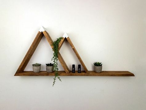 If you're looking for a rustic and chic way to organize your home, look no further than one of our 2 Peak Mountain Shelfs with a ledge. This beautiful wood shelf is perfect for the nursery, as an entryway organizer, in the living room, or bedroom. The natural wood finish and modern design make this shelf a must-have for any stylish home. Varathane Wood Stain, Mountain Shelf, Adventure Decor, Entryway Organizer, Knotty Pine, Organize Your Home, Entryway Organization, Oak Stain, Wood Shelf