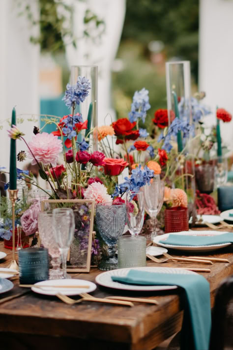 Variety of vintage glassware on farm table with blue, orange and red florals at reception at Welkinweir, one of the best historic Montgomery County wedding venues Blue Red Pink Wedding, Blue Red Wedding Color Schemes, Red White Blue Wedding, Blue Red Wedding, Wedding Colors Red, Vintage Wedding Table, July Wedding, Wedding Reception Venues, County Wedding