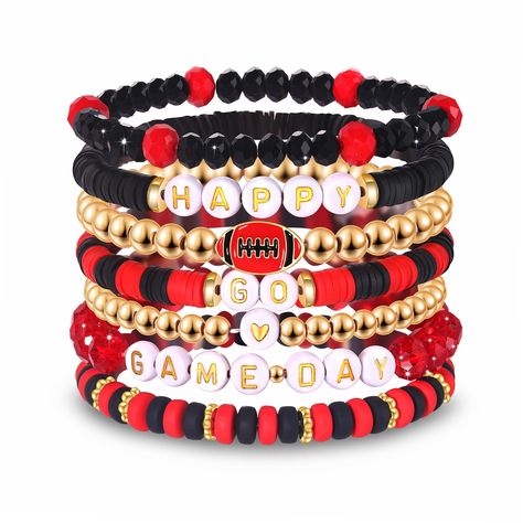 PRICES MAY VARY. Game Day Bracelets: It features a set of 7 heishi beaded bracelets, adorned with 6mm red and black polymer clay vinyl disc beads and with White & Gold Letter Beads spelling "HAPPY GO GAME DAY", Wear these red black team color bracelets with your favorite team game day outfits to complete your game day look in style Football Bracelets: It's Game Day Baby! Whether you're supporting your favorite national football team, cheering on your college football team, or showcasing your spi School Clay Bead Bracelet, Halloween Themed Clay Bead Bracelets, Bracelets Inspo Clay Beads, Nfl Clay Bead Bracelets, Bead Bracelet Words Ideas Bad, Pony Bead Bracelet Ideas, Bracelet Themes, Cheer Jewelry, Bracelets Preppy