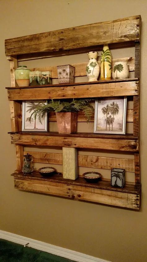 a large rustic pallet shelf stained, with photos, vases and candles on display for a rustic or vintage rustic space Pallet Projects Laundry Room, Floating Shelves Pallet Wood, Pallet Board Shelves, Pallet Shelving Ideas, Pallet Shelves Diy Wall Shelves, Pallet Trim Ideas, Pallet Floating Shelves, Pallet Board Projects, Pallet Bathroom Ideas