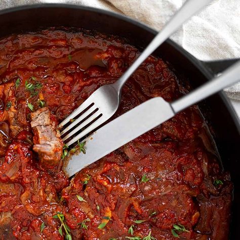 Swiss Steak is tenderized beef steaks cooked in a rich tomato sauce until tender and flavourful. A classic and comforting dish! Swiss Steak Recipes, Beef Steaks, Cooking Onions, Swiss Steak, Brunch Bread, Dump Meals, Steak Seasoning, Soup And Sandwich, Beef Dinner