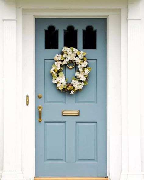 2024 Front Door Paint Color Trends Behr Oslo Blue Front Door, Soft Blue Front Door Colors, Cottage Door Colors, Light Blue Front Door Colors, Dusty Blue Front Door, Cottage Front Door Colors, Blue Front Door Brick House, Blue Front Door Colors Sherwin Williams, White House Blue Door